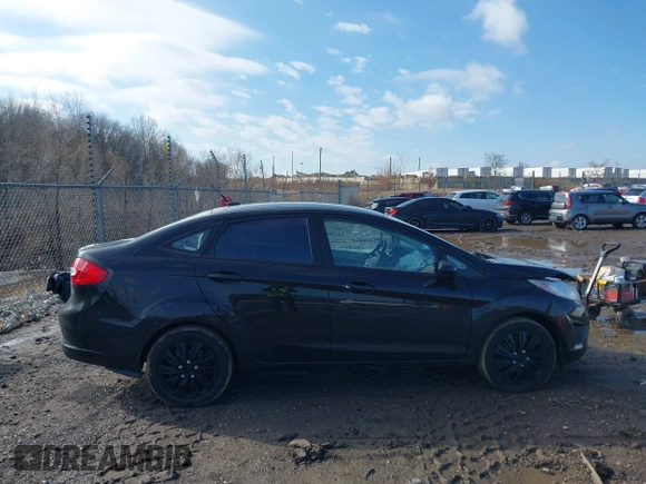 2013 Ford Fiesta S z VIN 3FADP4AJ2DM129703, wystawiony jako IAAI lot #41669041 z przebiegiem 138 831 mil mil oraz . Historia ofert i sprzedaży dostępna na DreamBid. Obrazek 13.