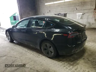 2023 Tesla Model 3 Long Range with VIN 5YJ3E1EB8PF392705, listed as a Copart auction lot 47595985 with 15,361 mi miles and Salvage Title. Bid and sale history available at DreamBid. Image 2.