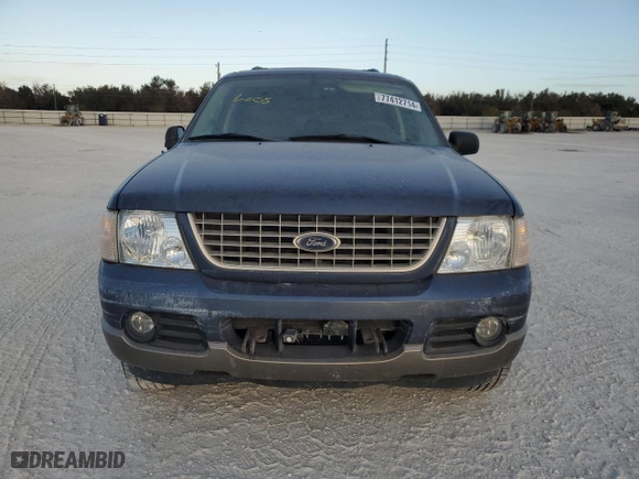 2003 Ford Explorer Eddie Bauer with VIN 1FMDU74W03UB71319, listed as a Copart auction lot 77412714 with 0 mi miles and Salvage Title. Bid and sale history available at carsss.com. Image 5.