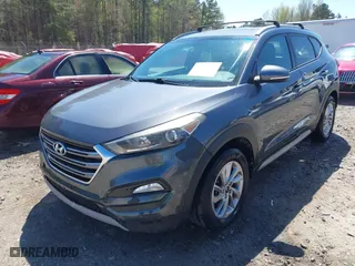 2017 Hyundai Tucson Value with VIN KM8J33A23HU405296, listed as a IAAI auction lot 41887237 with 114,027 mi miles. Bid and sale history available at carsss.com. Image 17.
