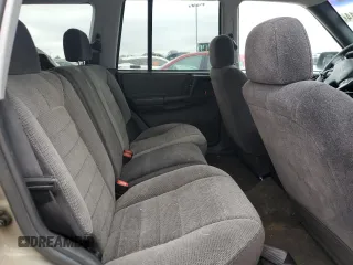 1998 Jeep Grand Cherokee Laredo with VIN 1J4FX58S0WC337066, listed as a Copart auction lot 69125414 with 0 mi miles and Salvage Title. Bid and sale history available at carsss.com. Image 11.