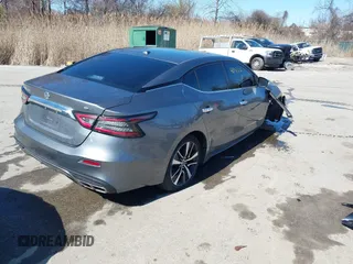 2021 Nissan Maxima SV z VIN 1N4AA6CV4MC508977, wystawiony jako IAAI lot #41858232 z przebiegiem 66 113 mil mil oraz . Historia ofert i sprzedaży dostępna na DreamBid. Obrazek 4.