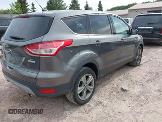 2013 Ford Escape SE with VIN 1FMCU0G96DUC26799, listed as a IAAI auction lot 42751599 with 116,312 mi miles and . Bid and sale history available at DreamBid. Image 4.