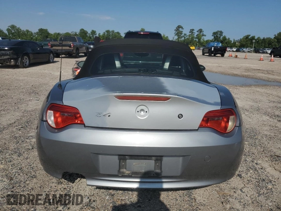 2006 BMW Z4 3.0si with VIN 4USBU53566LX00267, listed as a Copart auction lot 55820915 with 143,288 mi miles and Salvage title. Bid and sale history available at DreamBid. Image 6.