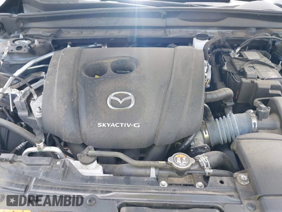 2024 Mazda CX-50 S Premium with VIN 7MMVABDM4RN157011, listed as a IAAI auction lot 42300111 with 39,863 mi miles and . Bid and sale history available at DreamBid. Image 10.