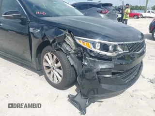 2017 Kia Optima EX with VIN 5XXGU4L35HG164578, listed as a IAAI auction lot 42646046 with 71,113 mi miles and . Bid and sale history available at DreamBid. Image 6.