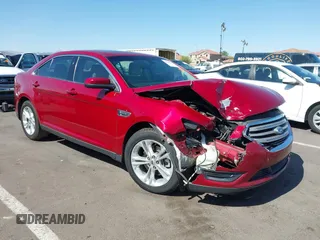2014 Ford Taurus SEL z VIN 1FAHP2E80EG105893, wystawiony jako IAAI lot #42314979 z przebiegiem 122 093 mil mil oraz . Historia ofert i sprzedaży dostępna na DreamBid. Obrazek 1.