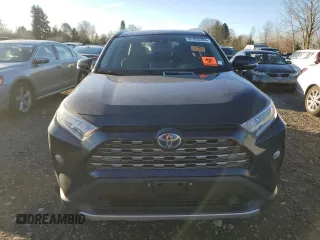 2020 Toyota RAV4 Hybrid Limited with VIN 2T3DWRFV3LW075010, listed as a Copart auction lot 87093284 with 0 mi miles and Salvage Title. Bid and sale history available at carsss.com. Image 5.