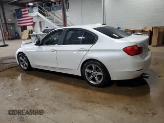 2013 BMW 3 Series 320i xDrive with VIN WBA3C3C5XDF982732, listed as a Copart auction lot 62852385 with 134,466 mi miles and Salvage title. Bid and sale history available at DreamBid. Image 2.