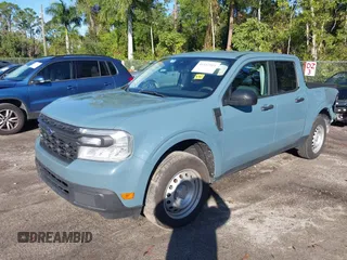 2023 Ford Maverick XL with VIN 3FTTW8E32PRA56304, listed as a IAAI auction lot 41147511 with 27,787 mi miles and . Bid and sale history available at DreamBid. Image 18.