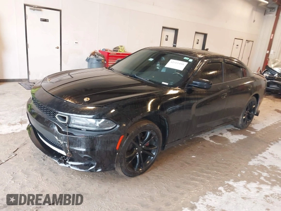 2015 Dodge Charger SXT z VIN 2C3CDXHG2FH741643, wystawiony jako IAAI lot #42321498 z przebiegiem 180 351 mil mil oraz . Historia ofert i sprzedaży dostępna na DreamBid. Obrazek 2.