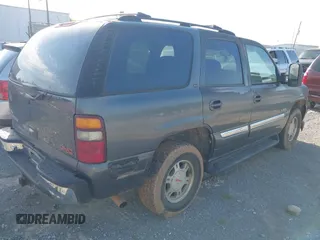 2001 GMC Yukon SLT with VIN 1GKEK13T81J177892, listed as a IAAI auction lot 41924669 with 198,561 mi miles. Bid and sale history available at carsss.com. Image 4.