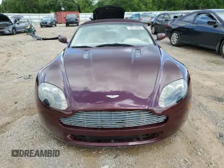 2008 Aston Martin Vantage z VIN SCFBF04B88GD08690, wystawiony jako Copart lot #56514635 z przebiegiem 63 229 mil mil oraz Tytuł czysty. Historia ofert i sprzedaży dostępna na DreamBid. Obrazek 5.