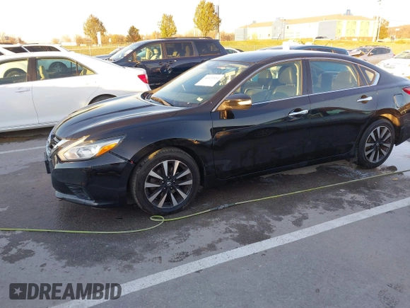 2018 Nissan Altima SR with VIN 1N4AL3AP7JC129741, listed as a IAAI auction lot 40923554 with 161,218 mi miles and . Bid and sale history available at carsss.com. Image 2.