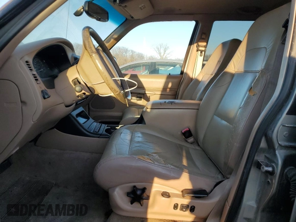2001 Ford Explorer Eddie Bauer with VIN 1FMZU84P01UB51671, listed as a Copart auction lot 82465744 with 127,592 mi miles and Clean title. Bid and sale history available at DreamBid. Image 7.