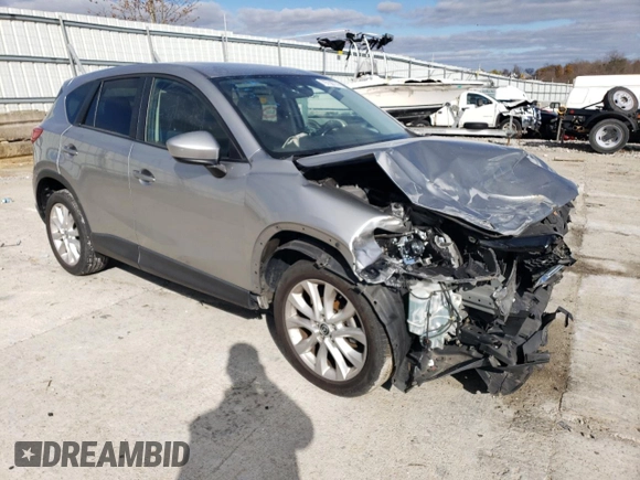 2013 Mazda CX-5 Grand Touring with VIN JM3KE4DE8D0102280, listed as a Copart auction lot 79750774 with 151,797 mi miles and Salvage Title. Bid and sale history available at DreamBid. Image 4.
