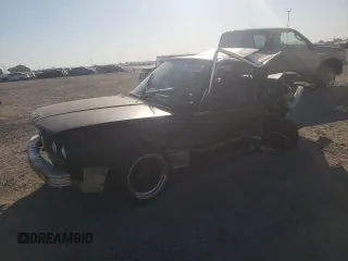 1984 BMW 3 Series 325e z VIN WBAAB5402E1002031, wystawiony jako Copart lot #72086004 z przebiegiem 866 397 mil mil oraz Szkoda całkowita • Salvage title. Historia ofert i sprzedaży dostępna na DreamBid. Obrazek 1.