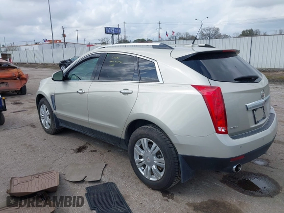 2014 Cadillac SRX Luxury Collection z VIN 3GYFNBE31ES628346, wystawiony jako IAAI lot #41709425 z przebiegiem 47 634 mil mil oraz . Historia ofert i sprzedaży dostępna na DreamBid. Obrazek 3.