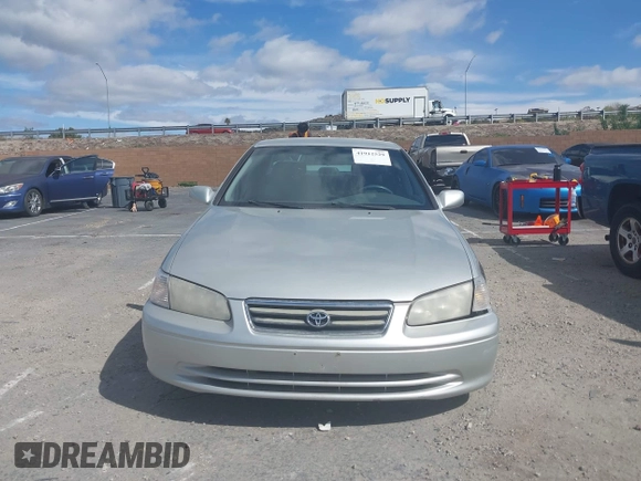 2000 Toyota Camry CE with VIN 4T1BG22K9YU701196, listed as a IAAI auction lot 41912529 with 208,026 mi miles. Bid and sale history available at carsss.com. Image 12.