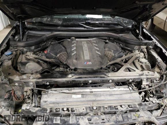 2021 BMW X5 M z VIN 5YMJU0C07M9E05109, wystawiony jako Copart lot #86393584 z przebiegiem 47 274 mil mil oraz Szkoda całkowita • Salvage title. Historia ofert i sprzedaży dostępna na DreamBid. Obrazek 12.