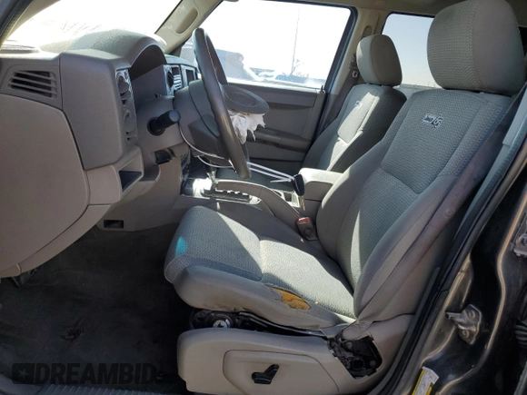 2006 Jeep Commander with VIN 1J8HH48K26C263986, listed as a Copart auction lot 84712294 with 216,923 mi miles and Salvage title. Bid and sale history available at DreamBid. Image 7.