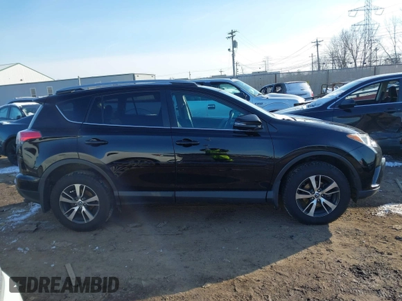 2018 Toyota RAV4 XLE with VIN 2T3RFREV1JW808773, listed as a IAAI auction lot 41595377 with 109,309 mi miles. Bid and sale history available at carsss.com. Image 14.