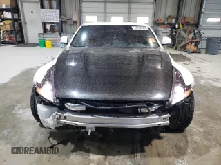 2012 Nissan 370Z z VIN JN1AZ4EH2CM564443, wystawiony jako Copart lot #45126885 z przebiegiem 71 729 mil mil oraz Szkody całkowita. Historia ofert i sprzedaży dostępna na DreamBid. Obrazek 5.