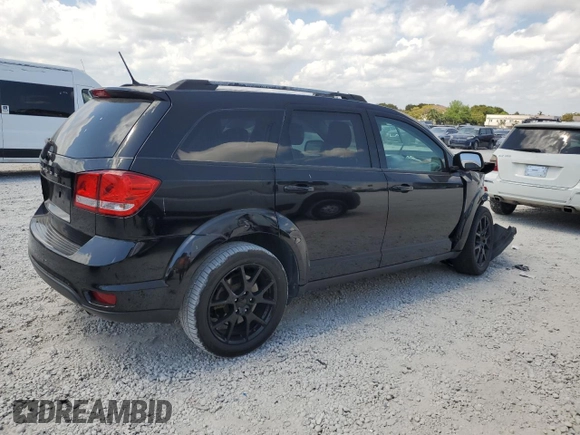 2017 Dodge Journey SXT with VIN 3C4PDCBBXHT701338, listed as a Copart auction lot 48244005 with 66,418 mi miles and Salvage Title. Bid and sale history available at DreamBid. Image 3.