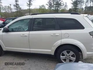 2014 Dodge Journey SE with VIN 3C4PDCABXET135338, listed as a IAAI auction lot 41950088 with 209,944 mi miles. Bid and sale history available at carsss.com. Image 14.