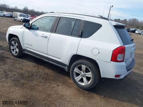 2012 Jeep Compass Latitude with VIN 1C4NJDEB5CD584509, listed as a IAAI auction lot 41672784 with 166,271 mi miles. Bid and sale history available at carsss.com. Image 3.