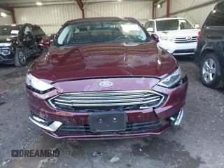 2017 Ford Fusion SE z VIN 3FA6P0HD2HR122650, wystawiony jako IAAI lot #41965411 z przebiegiem 107 227 mil mil oraz . Historia ofert i sprzedaży dostępna na DreamBid. Obrazek 12.
