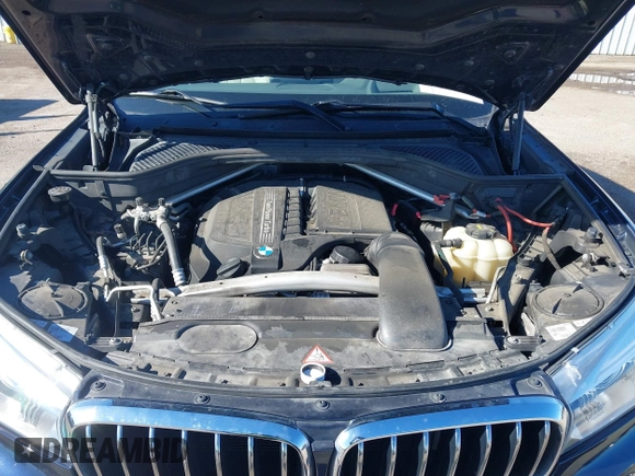 2016 BMW X5 sDrive35i with VIN 5UXKR2C55G0R71330, listed as a IAAI auction lot 41661140 with 128,457 mi miles. Bid and sale history available at carsss.com. Image 10.