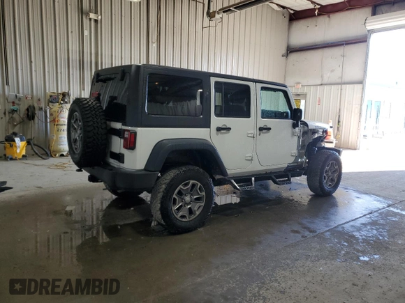 2016 Jeep Wrangler Unlimited Rubicon Hard Rock with VIN 1C4HJWFG2GL291505, listed as a Copart auction lot 47205725 with 39,771 mi miles and Salvage Title. Bid and sale history available at carsss.com. Image 3.