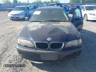2004 BMW 3 Series 325i with VIN WBAET374X4NJ95019, listed as a IAAI auction lot 42008229 with 1 mi miles. Bid and sale history available at carsss.com. Image 6.