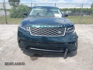 2021 Land Rover Range Rover Velar S z VIN SALYJ2EX6MA317761, wystawiony jako IAAI lot #42127567 z przebiegiem 63 352 mil mil oraz . Historia ofert i sprzedaży dostępna na DreamBid. Obrazek 12.