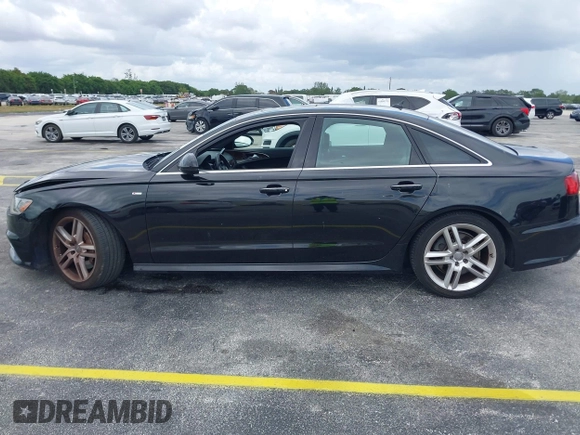 2016 Audi A6 2.0T Premium Plus with VIN WAUGFAFC6GN055826, listed as a IAAI auction lot 42011778 with 98,210 mi miles. Bid and sale history available at carsss.com. Image 14.