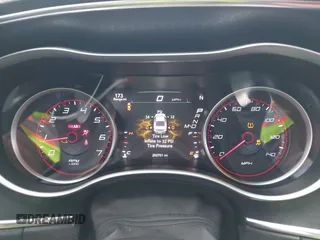 2015 Dodge Charger SXT with VIN 2C3CDXHG4FH884058, listed as a IAAI auction lot 41724894 with 202,701 mi miles and . Bid and sale history available at DreamBid. Image 7.