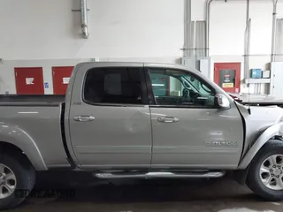 2005 Toyota Tundra SR5 with VIN 5TBDT44155S480004, listed as a IAAI auction lot 42137500 with 209,856 mi miles and . Bid and sale history available at DreamBid. Image 14.