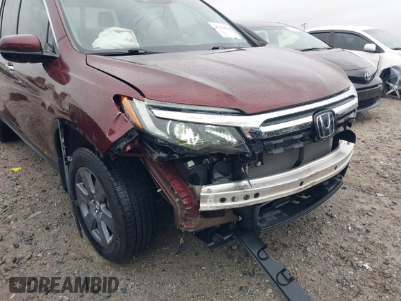 2020 Honda Ridgeline RTL-E with VIN 5FPYK3F7XLB012298, listed as a IAAI auction lot 42230880 with 48,252 mi miles and . Bid and sale history available at DreamBid. Image 6.