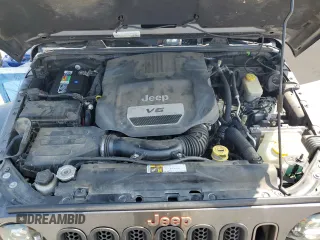 2016 Jeep Wrangler Unlimited Sahara with VIN 1C4BJWEG6GL212733, listed as a Copart auction lot 62664445 with 114,004 mi miles and Salvage title. Bid and sale history available at DreamBid. Image 12.