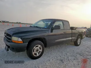 2001 Dodge Dakota z VIN 1B7GL22X01S328598, wystawiony jako Copart lot #57521505 z przebiegiem 207 173 mil mil oraz Szkoda całkowita • Salvage title. Historia ofert i sprzedaży dostępna na DreamBid. Obrazek 1.