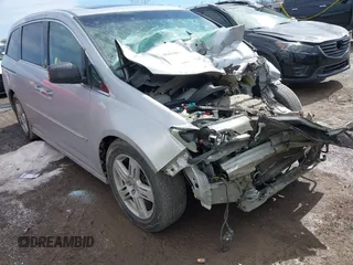 2011 Honda Odyssey Touring with VIN 5FNRL5H98BB006194, listed as a IAAI auction lot 41634887 with Not Provided miles and . Bid and sale history available at DreamBid. Image 1.