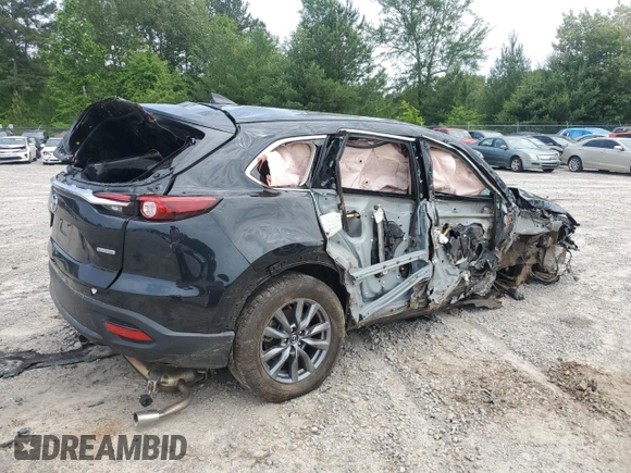 2023 Mazda CX-9 Touring z VIN JM3TCBCY5P0647237, wystawiony jako Copart lot #56338625 z przebiegiem Nie podano mil oraz Szkoda całkowita • Salvage title. Historia ofert i sprzedaży dostępna na DreamBid. Obrazek 3.