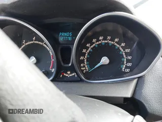 2015 Ford Fiesta SE z VIN 3FADP4BJ7FM223576, wystawiony jako IAAI lot #41505260 z przebiegiem 127 778 mil mil oraz . Historia ofert i sprzedaży dostępna na DreamBid. Obrazek 7.