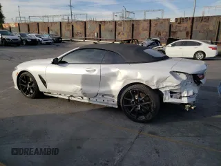 2023 BMW 8 Series 840i with VIN WBADZ2C08PCL26584, listed as a Copart auction lot 79798573 with 7,025 mi miles. Bid and sale history available at carsss.com. Image 2.