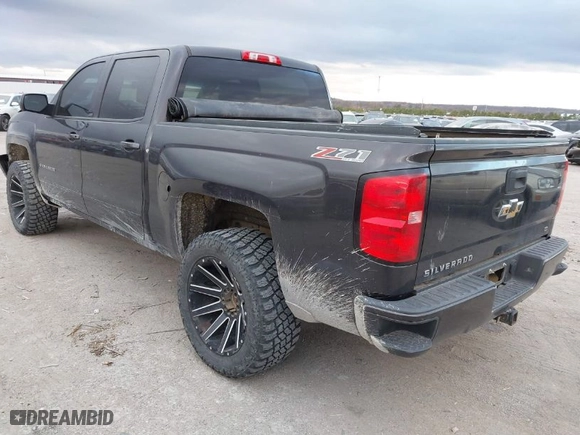 2016 Chevrolet Silverado 1500 LT with VIN 3GCUKREC0GG252047, listed as a IAAI auction lot 41004266 with 170,817 mi miles. Bid and sale history available at carsss.com. Image 3.