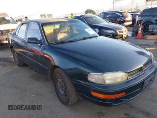 1995 Toyota Camry LE z VIN JT2GK12E1S0081545, wystawiony jako IAAI lot #41408845 z przebiegiem 297 297 mil mil oraz . Historia ofert i sprzedaży dostępna na DreamBid. Obrazek 1.