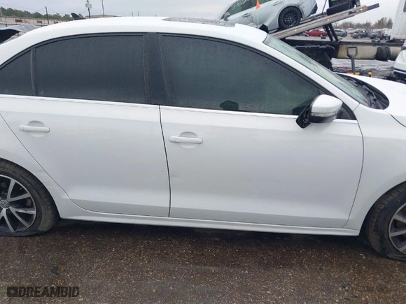 2018 Volkswagen Jetta 1.4T SE with VIN 3VWDB7AJ1JM221517, listed as a IAAI auction lot 41329474 with 87,450 mi miles. Bid and sale history available at carsss.com. Image 13.