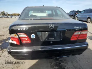 2000 Mercedes-Benz E-Class AWD with VIN WDBJF82J4YX039134, listed as a Copart auction lot 78083864 with 172,264 mi miles and Salvage Title. Bid and sale history available at carsss.com. Image 6.
