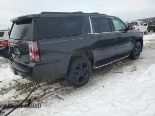 2015 GMC Yukon XL z VIN 1GKS2GECXFR210029, wystawiony jako Copart lot #84109134 z przebiegiem 176 419 mil mil oraz Tytuł czysty. Historia ofert i sprzedaży dostępna na DreamBid. Obrazek 3.